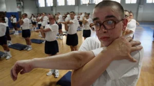 Since 1990, glasses-wearing Navy recruits have been required to wear their standard-issue S9 eyeglasses through training.  Credit: NPR